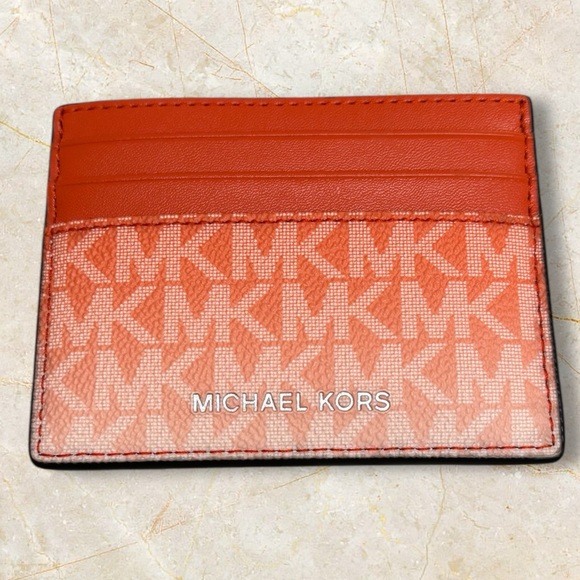 Michael Kors Accessories - Michael Kors ombré orange card case NWT